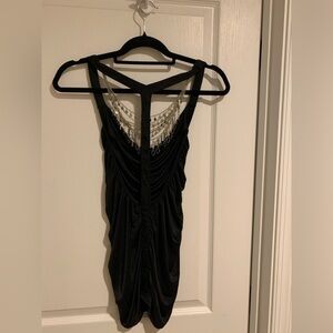 Black Rouch T-Strap Shirt with Silver chain Detail.